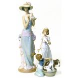 Three Lladro figures of ladies We are unable to do condition reports on our Interiors Sale