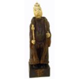 An early 20th Century German carved wood and ivory automaton, modelled as a humorous Germanic