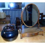 19th century mahogany and cross-banded serpentine front dressing mirror enclosing three drawers