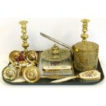 A collection of brass to include a pair of candlesticks, saucepan, pierced inkwell, 4 castors,
