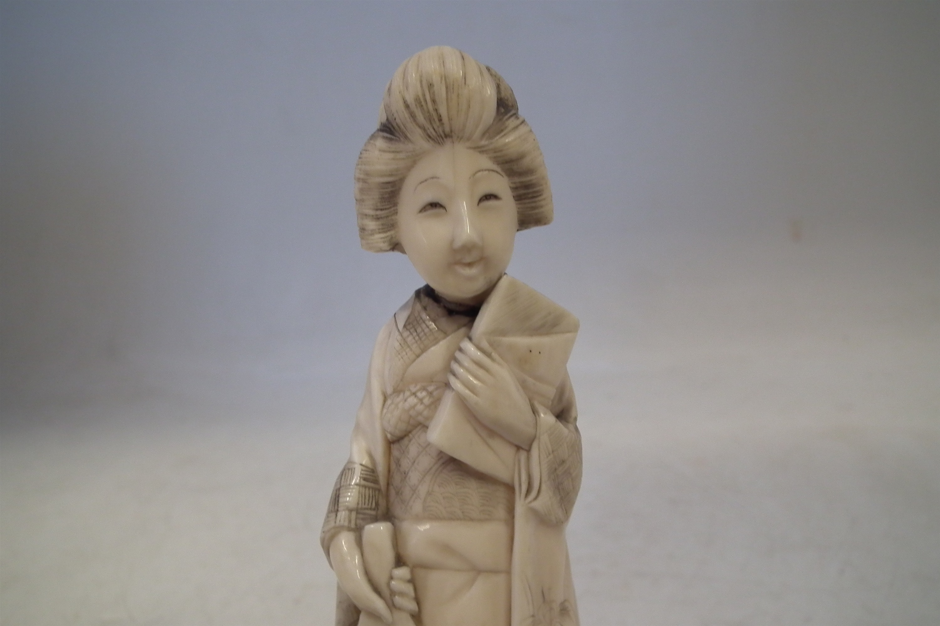 Japanese Ivory okimono, depicting a Geisha holding a book, signed to the base Meiji Period 1868- - Image 2 of 8