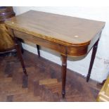 19th century mahogany fold over games table on turned and fluted legs We are unable to do