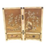 A fine Meji Period Japanese ivory shibayama folding table screen, circa 1900. The exterior lacquered