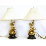 Pair of gilt cherub lamp bases and shades We are unable to do condition reports on our Interiors