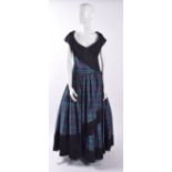 A Catherine Walker tartan ballgown, labelled size 12. We are unable to do condition reports on our