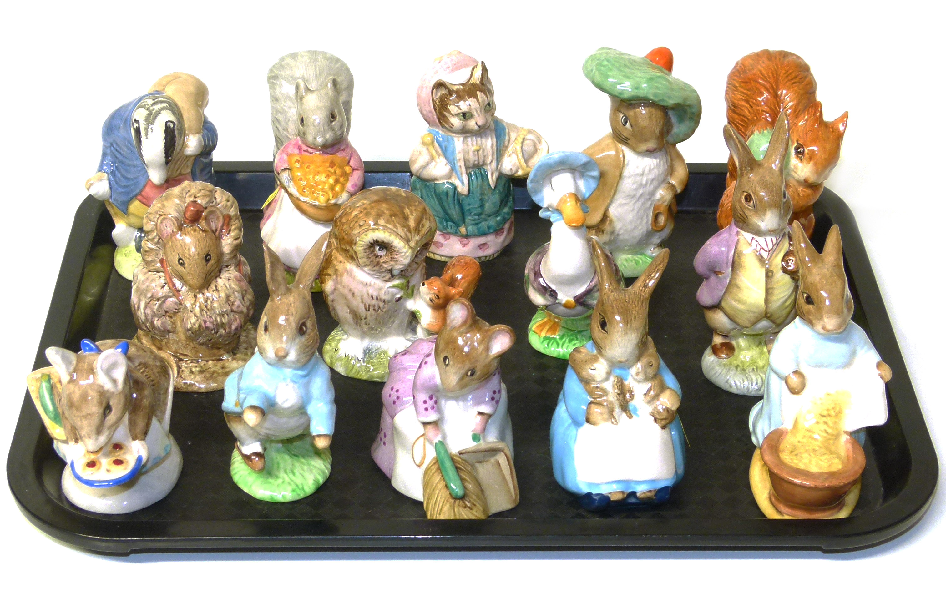 Fourteen Beswick Beatrix Potter figures, all with brown marks. (chips to Peter Rabbit, Apply