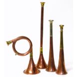Copper and brass Swaine & Adeney (London) hunting horn and three others. We are unable to do