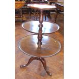 George III mahogany graduated three tier dumb waiter on tripod base. We are unable to do condition
