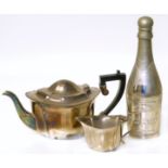 EPNS melonium champagne bottle and EPNS teapot and milk jug We are unable to do condition reports on