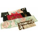 Four designer scarves, to include a Christian Dior pink brown and blue silk scarf with a floral