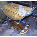 Modern marquetry style Italian two tier drinks trolley. We are unable to do condition reports on our