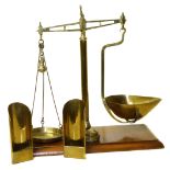 Set brass balance scales by Henderson Brothers. Glasgow, two weights (8oz & 4ox) and two scoops