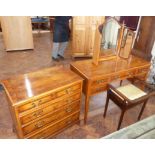 Modern yew wood chest of drawers and dressing table with triple mirror and Edwardian stool. We are