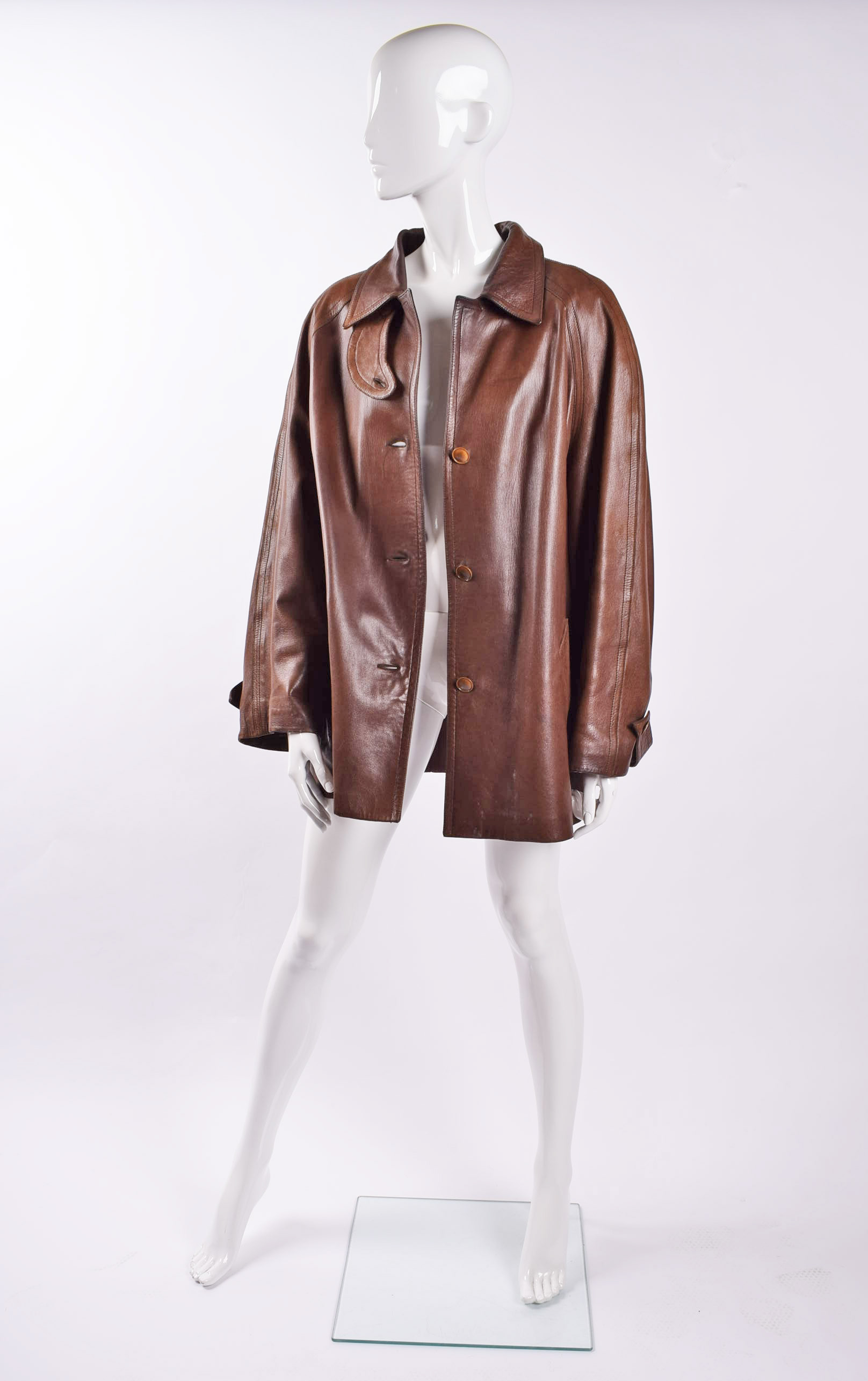 A Hermes leather jacket, the brown lamb leather jacket with button fastening, labelled size 44. We