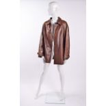 A Hermes leather jacket, the brown lamb leather jacket with button fastening, labelled size 44. We