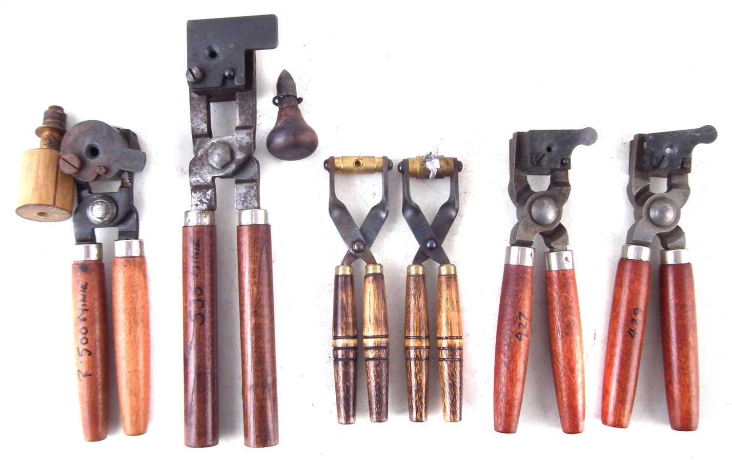 Two Lyman bullet moulds, an RCBS mould and three others