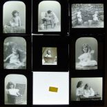 A total of 60 black and white lantern slides "A cup of tea for Dolly" "A little chorister" "Dolly