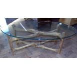 Gilt and frame coffee table with oval glass top. Condition reports are not available for our