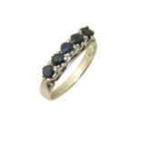 A sapphire five stone ring, the circular shape sapphire line with tapered shoulders, ring size Q,