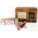 Regentone walnut cased radio and a Pelham puppet. Condition reports are not available for our