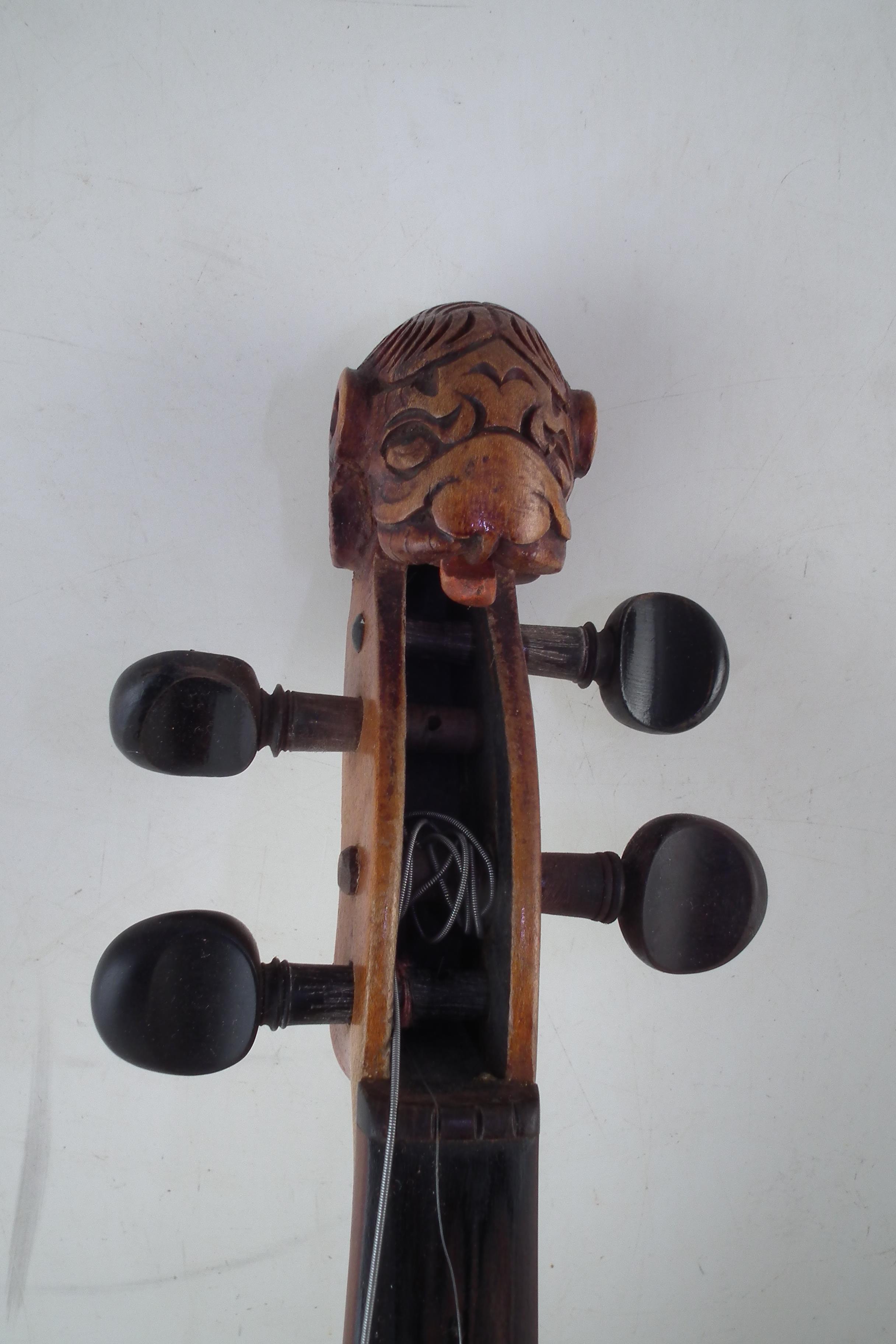 German lion head scroll violin together with one other violin, both with cases. - Image 2 of 14