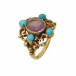 A 9ct gold paste and turquoise dress ring, the circular shape purple paste with a circular turquoise