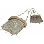 Two silver mesh bags, of typical form, one with hallmarks for Chester and the other with Chinese