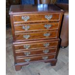 Mahogany chest on chest of small proportions. Condition reports are not available for our