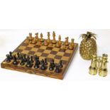 Chess set, heavy brass pineapple, and a pair of brass binoculars Condition reports are not available