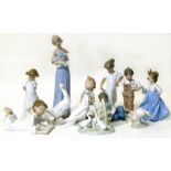 Eleven Nao figures and one Lladro figure. Condition reports are not available for our Interiors