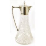 Silver mounted claret jug with mask spout Condition reports are not available for our Interiors