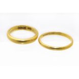 Two 22ct gold band rings, ring sizes K and N1/2, gross weight 7.1g. Condition reports are not