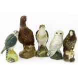 Beswick Merlin, snowy owl, Osprey, Buzzard and a Royal Doulton Grouse decanter Condition reports are