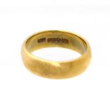 An 18ct gold band ring, hallmarks for Birmingham, ring size T, gross weight 10.4g. Condition reports