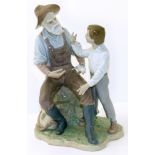 Lladro figure of a Boy and Father fishing. Condition reports are not available for our Interiors