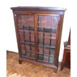 Later Victorian two door glazed bookcases. Condition reports are not available for our Interiors