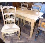 Victorian style pine kitchen table on turned legs 152cm x 89cm and four oak French style rush seated