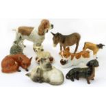 Four Beswick dogs, two cats models. fox, Jersey calf and a donkey Condition reports are not