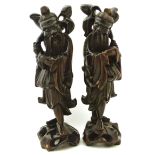 Pair of Chinese hardwood figures Condition reports are not available for our Interiors Sale