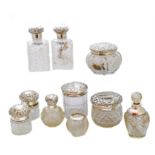 A selection of Victorian and later silver lidded jars,