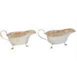 A pair of George VI silver sauce boats,