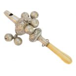 An ivory handled rattle,
