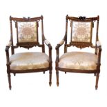 A pair of late 19th century French walnut framed salon chairs