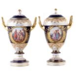 A pair of Dresden twin handled lidded vases