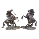 A pair of Bronze Marley horses after Coustan