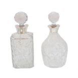 Two silver topped cut glass decanters,