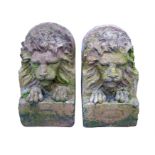 A pair of terracotta lion corbels marked with a Mason Winter Hill Brick Works, Bolton 56cm (22")