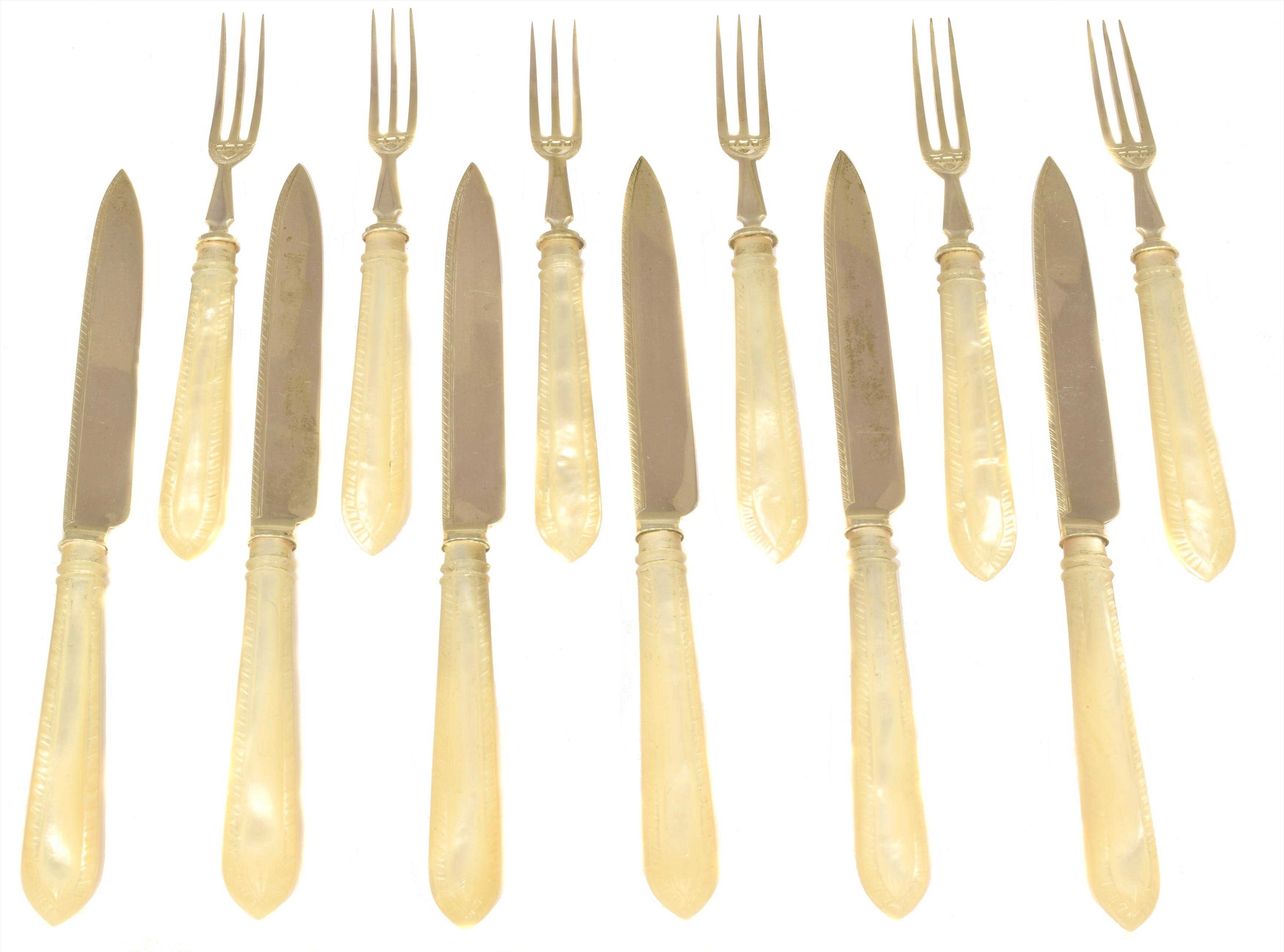 A set of Victorian silver fruit knives and forks,