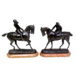 Pair of bronze figures of huntsmen