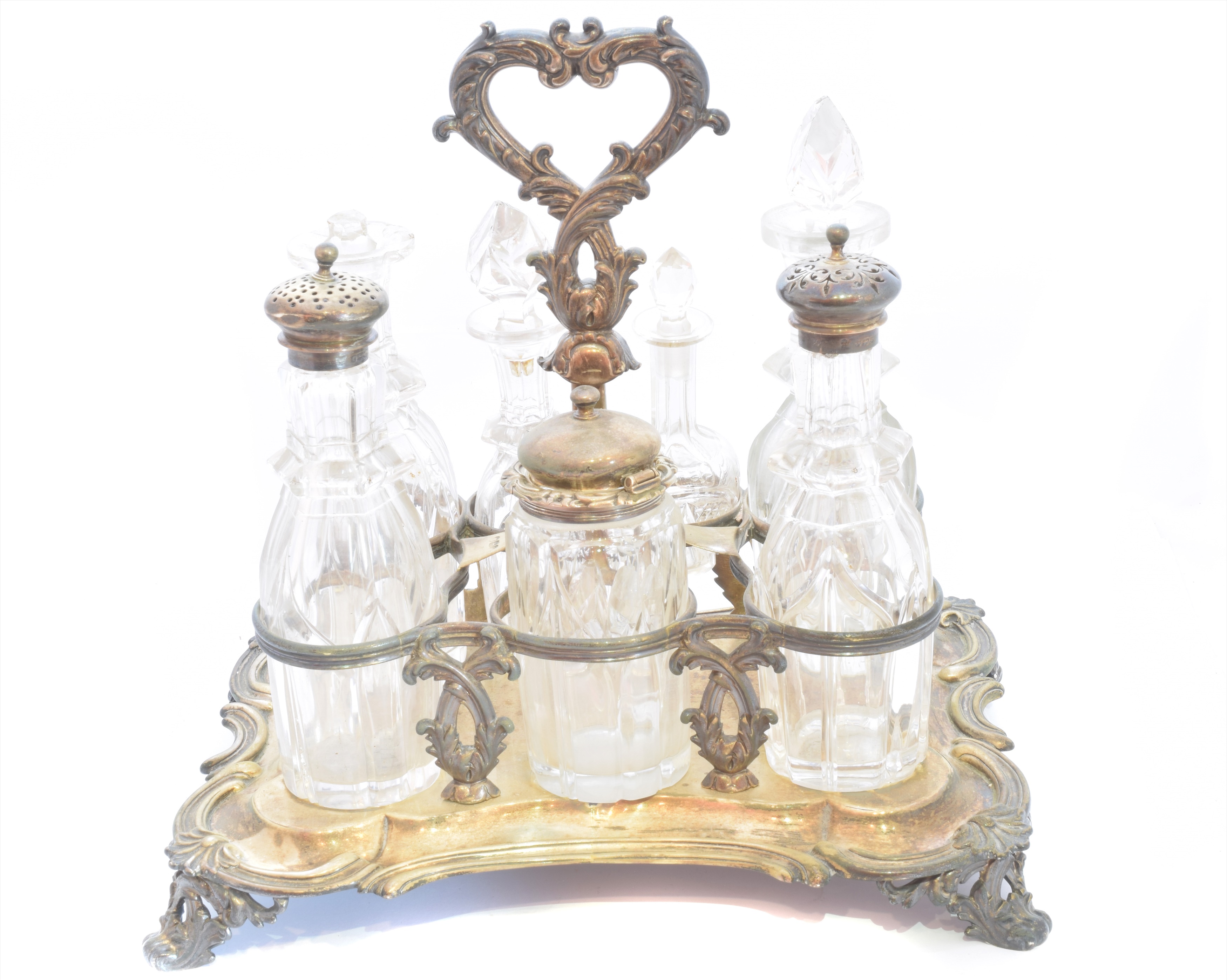 A Victorian silver seven bottle cruet set,